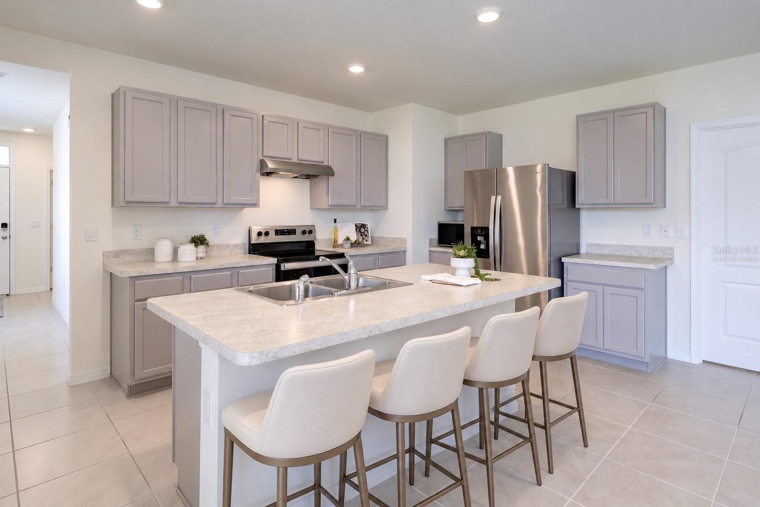 Virtually Staged, Eat-in Kitchen features Grey Cabinetry - 2415 BRASSIE CT, WINTER HAVEN