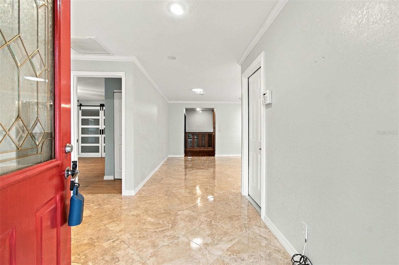 A spacious foyer leads into this stunning home. - 2254 HERON CIR, CLEARWATER