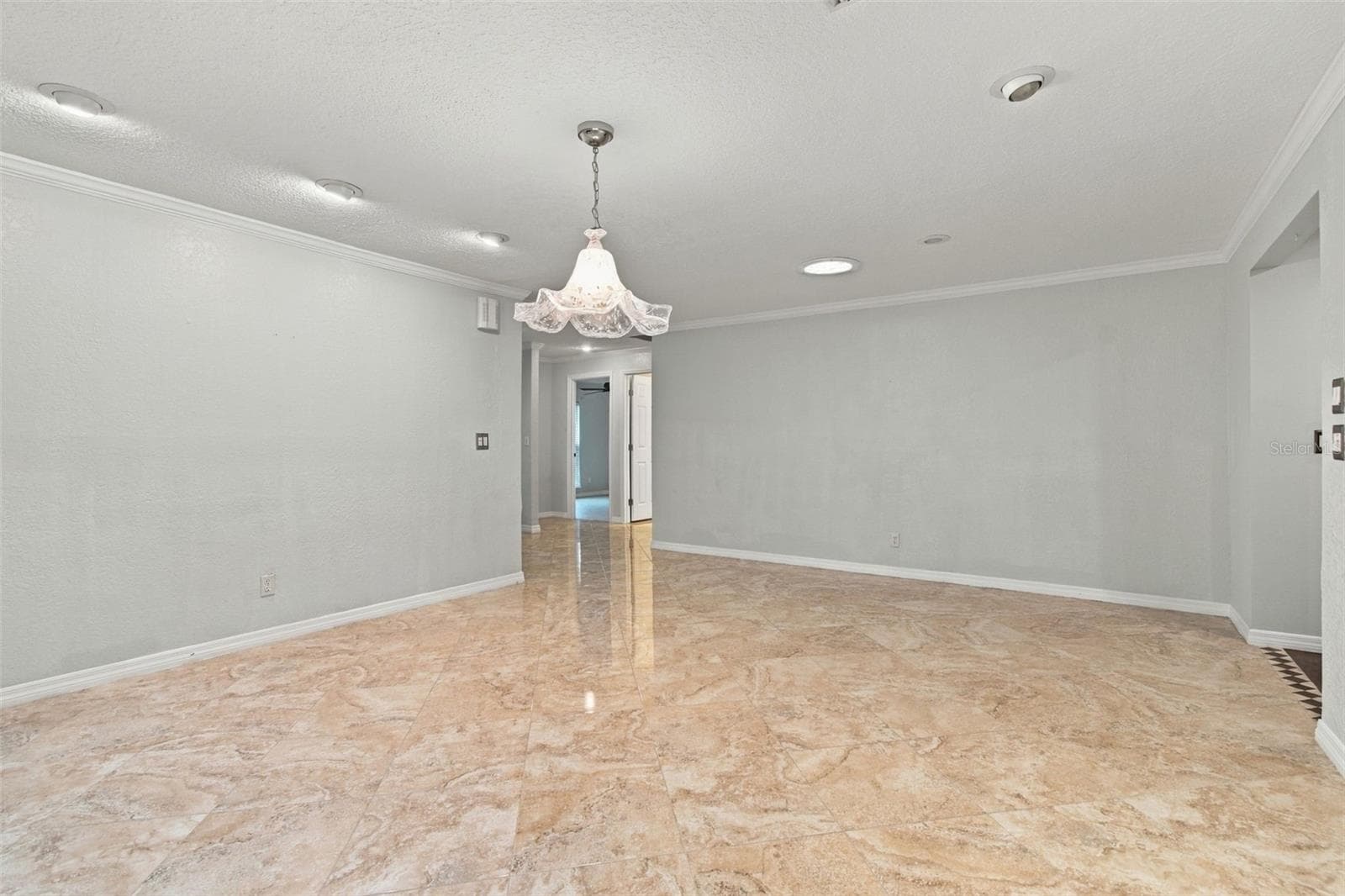 This dining room view looks toward the front bedroom. Again, this shot shows the wall space as well as the room's space. - 2254 HERON CIR, CLEARWATER