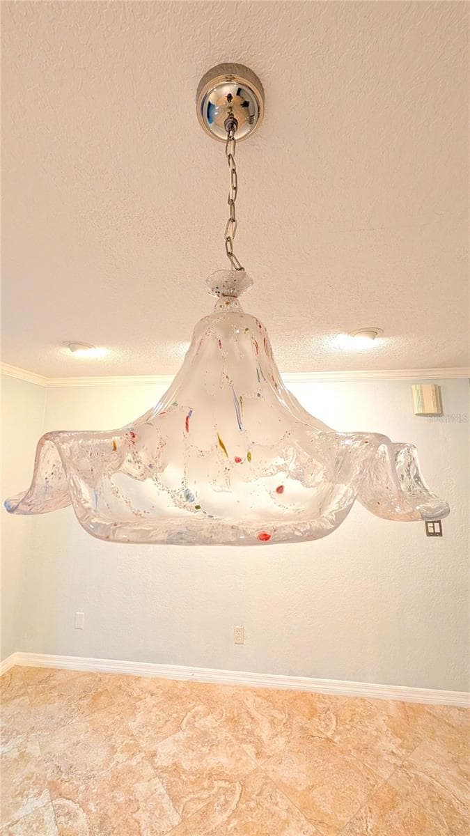 Dining room features a stunning Murano Millefiori Pendant Light Chandelier. - 2254 HERON CIR, CLEARWATER