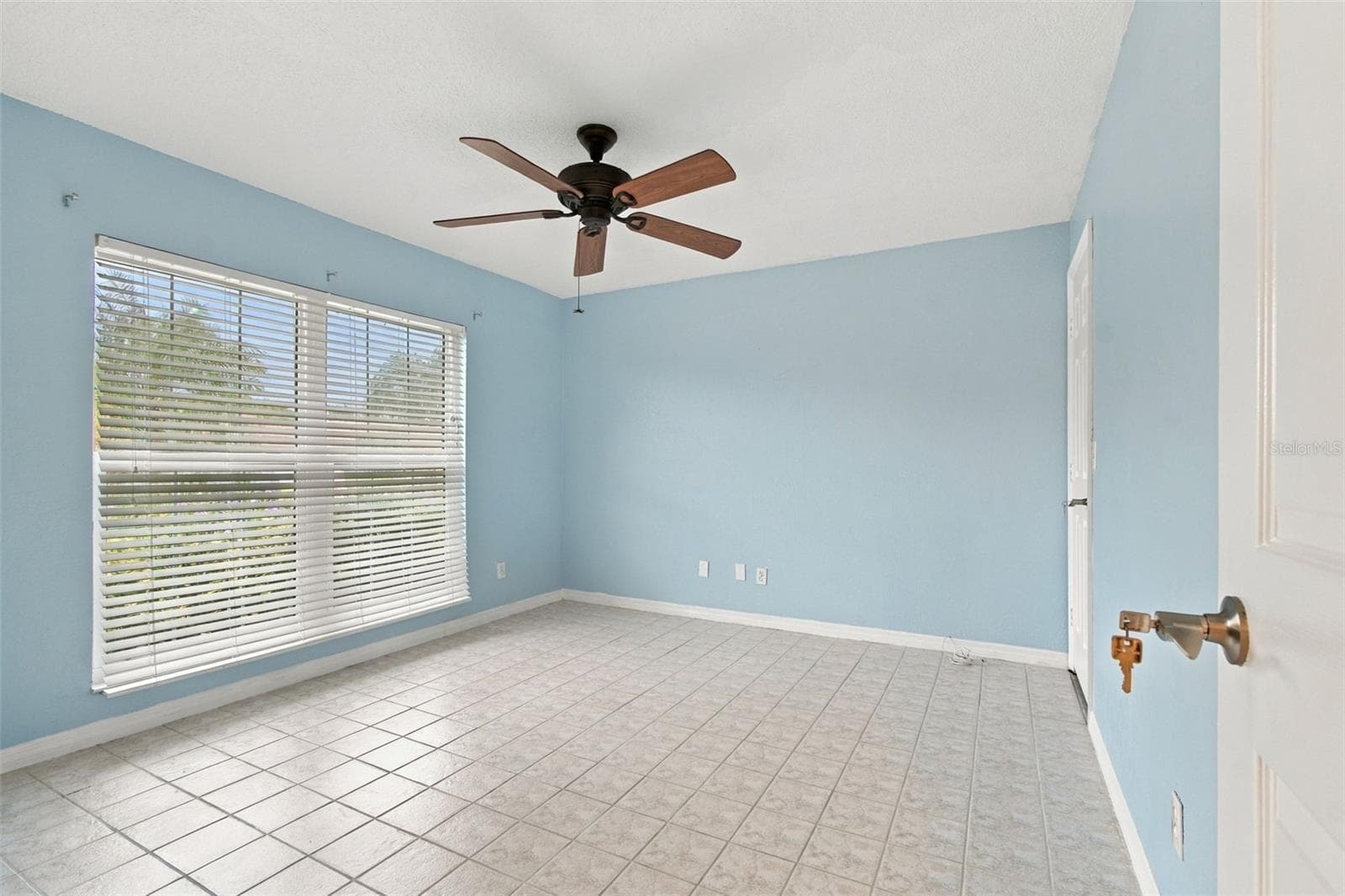 This is the front bedroom with a large walk-in closet. - 2254 HERON CIR, CLEARWATER