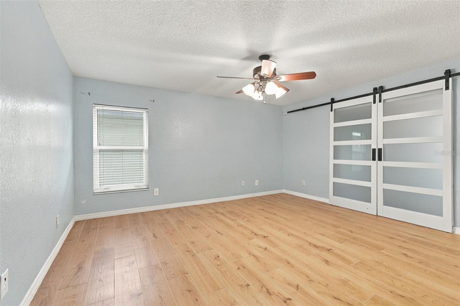 Second bedroom with full wall closet. - 2254 HERON CIR, CLEARWATER