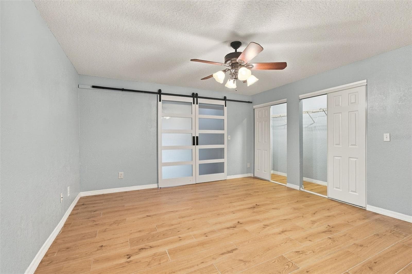 Second bedroom with full wall closet. - 2254 HERON CIR, CLEARWATER