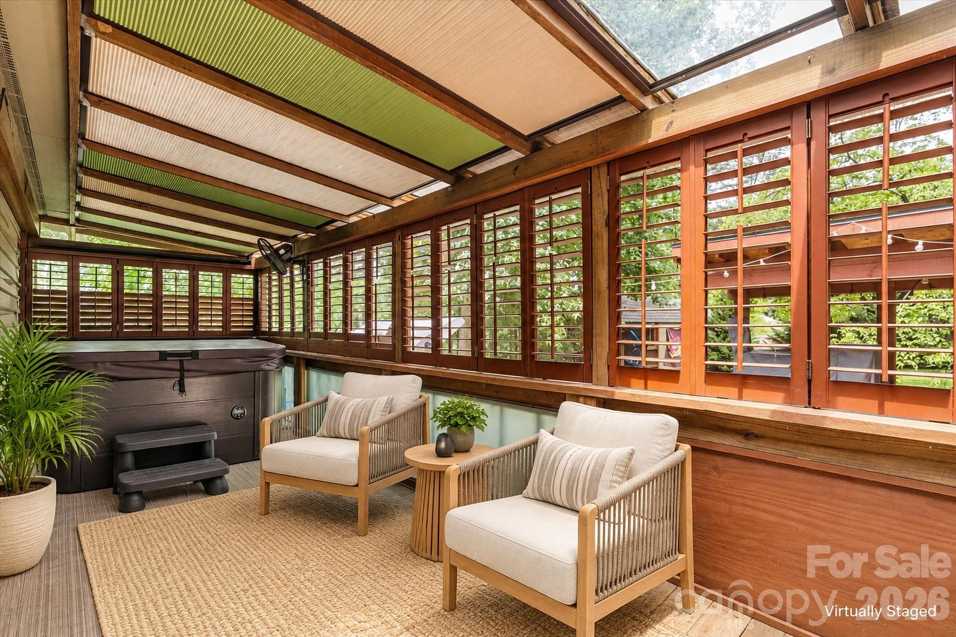 Covered Patio with hot tub, screen Virtually Staged - 7697 Katherine Drive, Denver