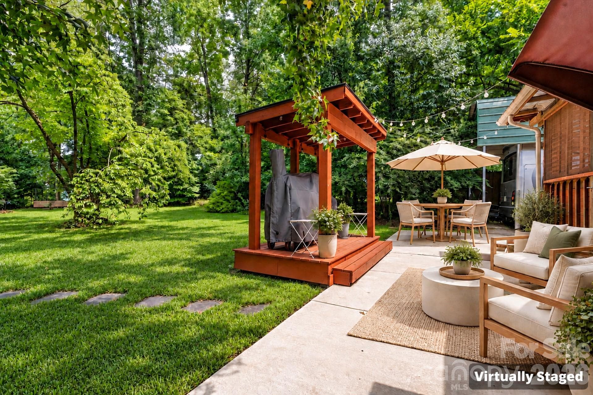Backyard landscape with Grill Canopy Virtually Staged - 7697 Katherine Drive, Denver
