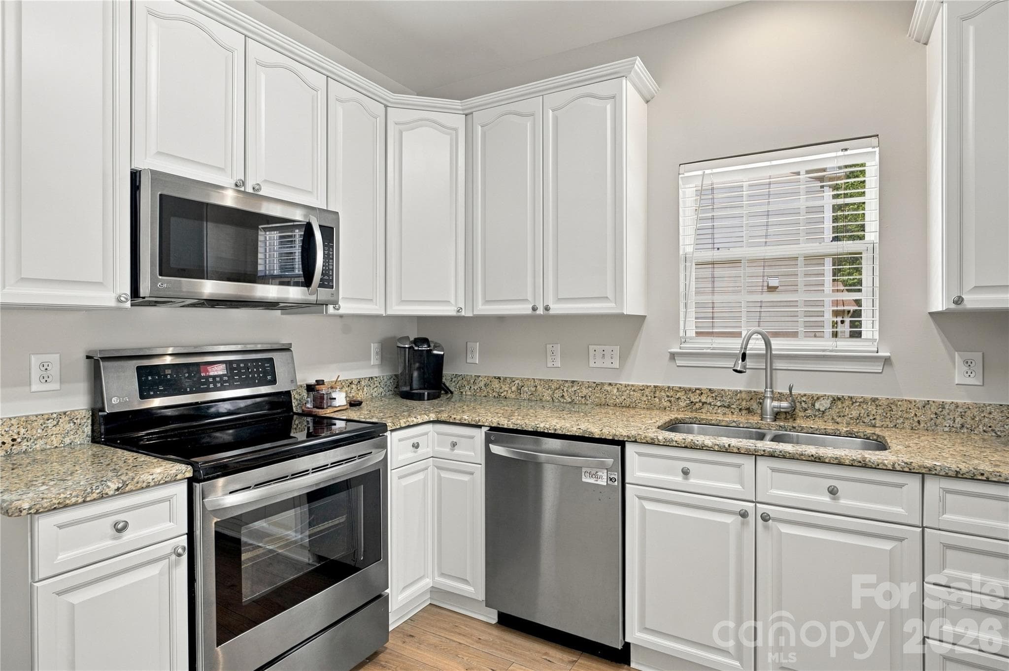 kitchen with flat top stove, microwave hood vent - 195 Huntly Lane, Mooresville