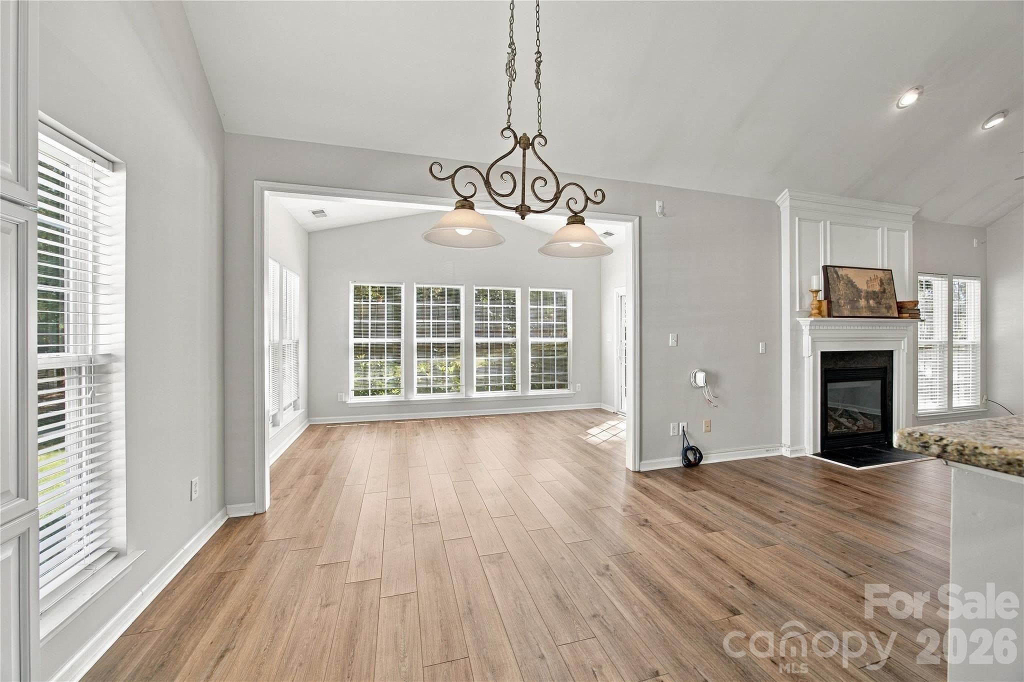 breakfast room looking into the greatroom right and sunroom to the rear - 195 Huntly Lane, Mooresville