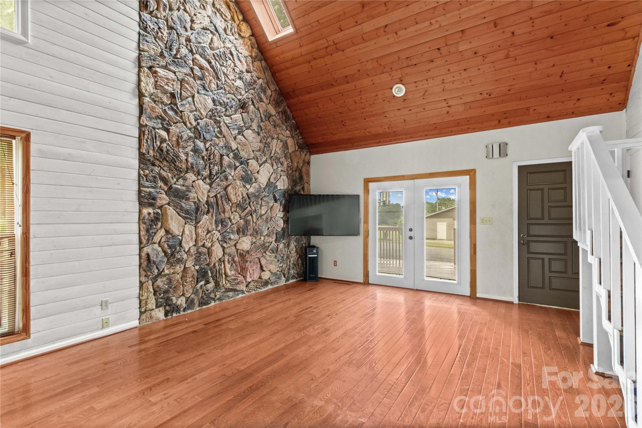 Stone Accent Wall and Vaulted Great Room - 296 Hicks Creek Road, Troutman