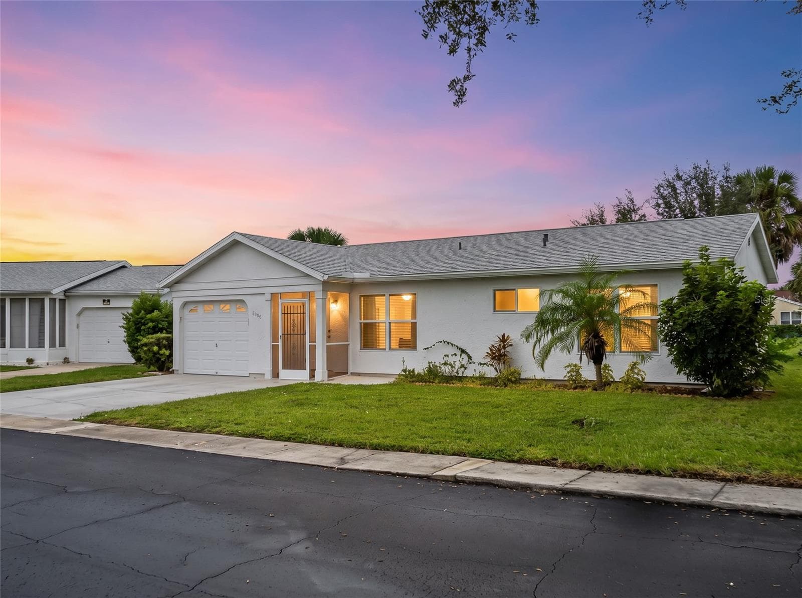 FrontExterior_8130PickwickRd_NorthPort_CurbAppeal_Twilight2.jpg - 8130 PICKWICK RD, NORTH PORT