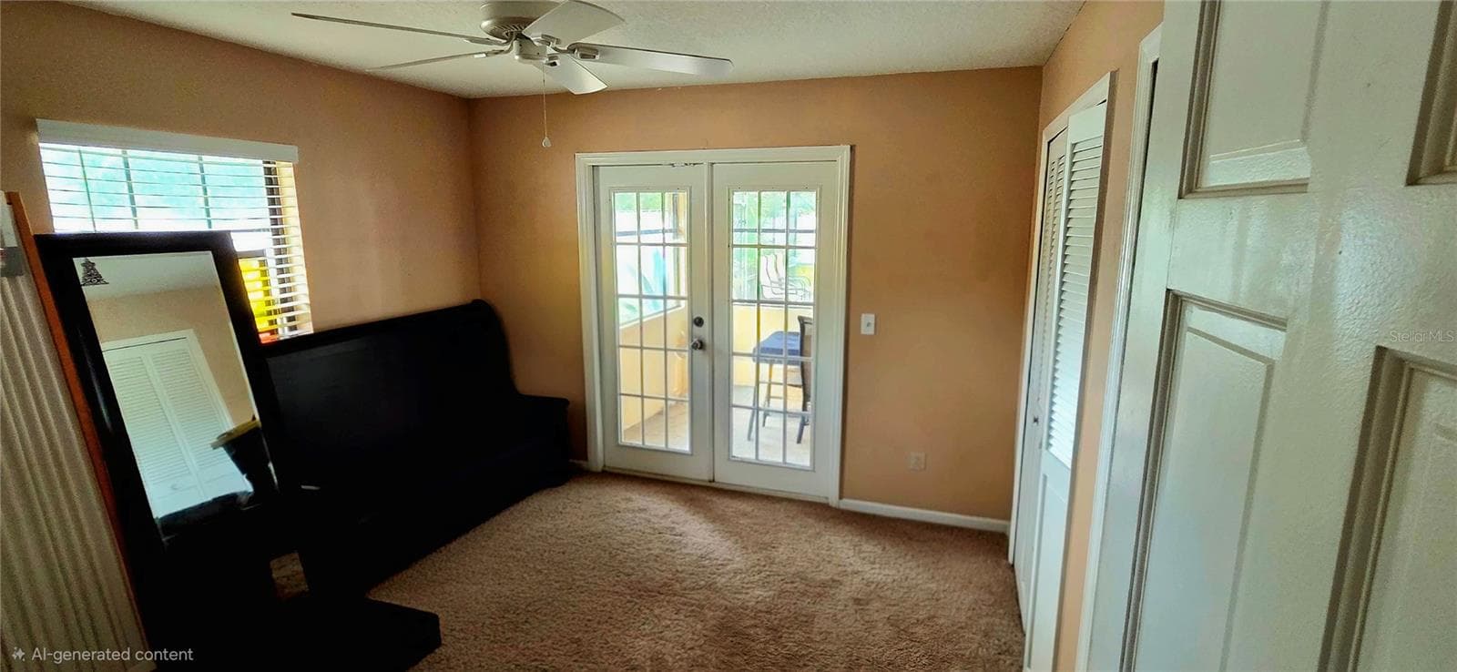 3rd bedroom with french doors to Florida room - 678 FAIRCHILD AVE, DELTONA