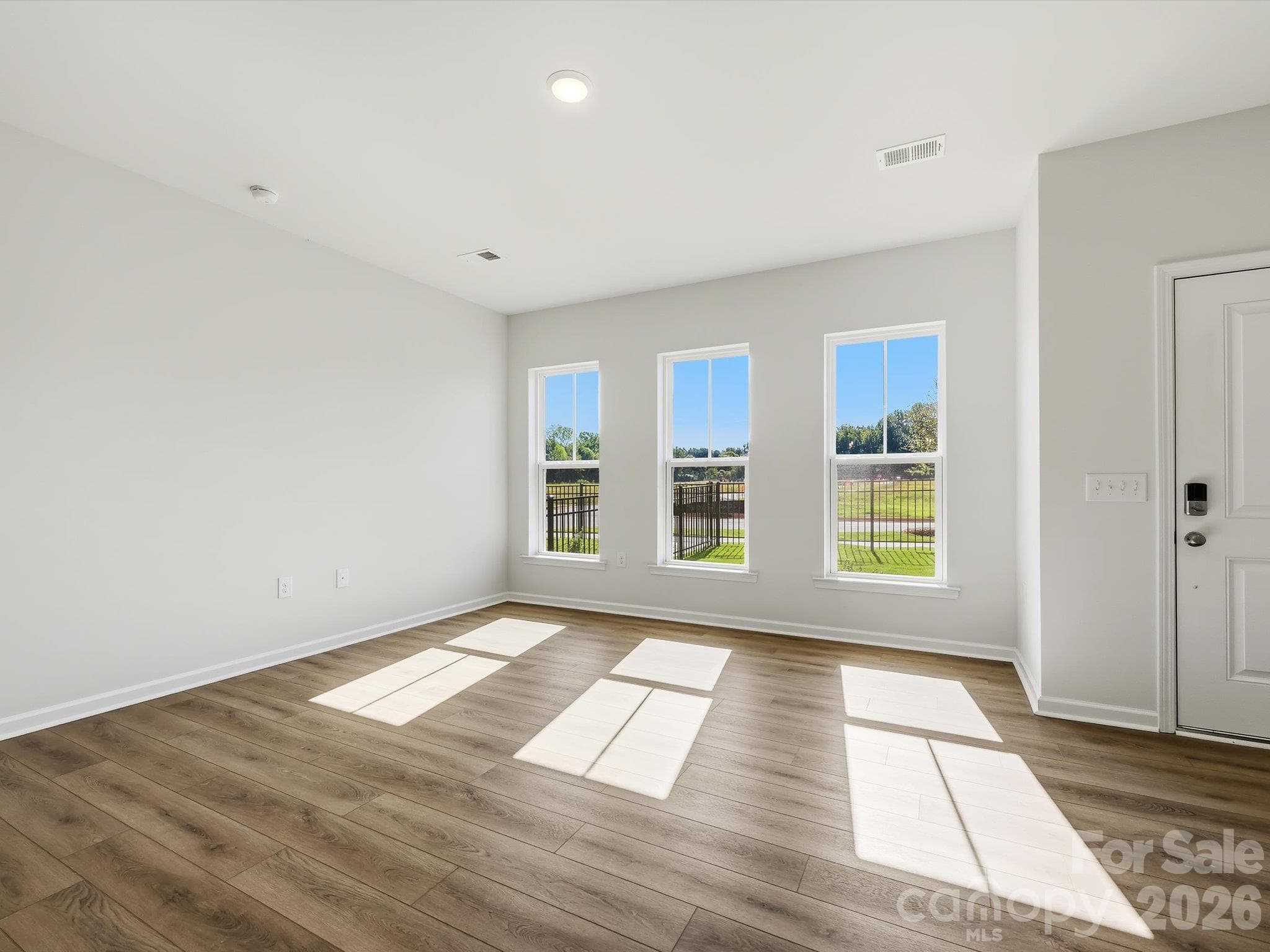 Living Room Offering an Abundance of Natural Light - 6617 Fire Lily Lane, Charlotte