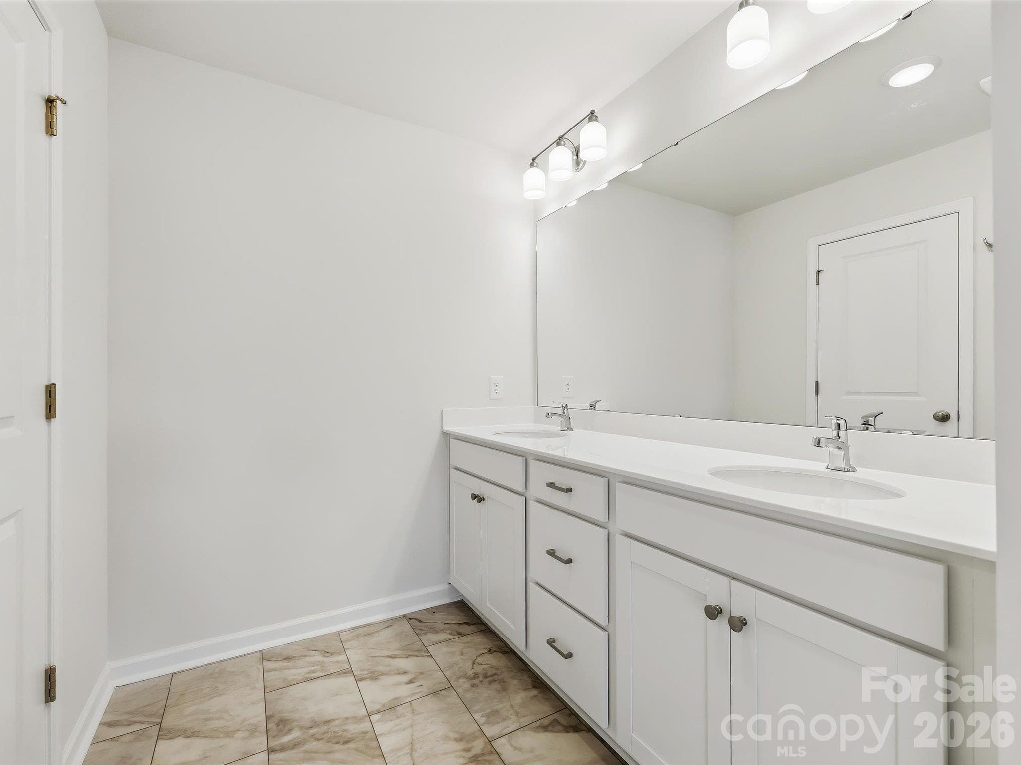 Owner's Bathroom Offering a Dual Sink Vanity - 6617 Fire Lily Lane, Charlotte