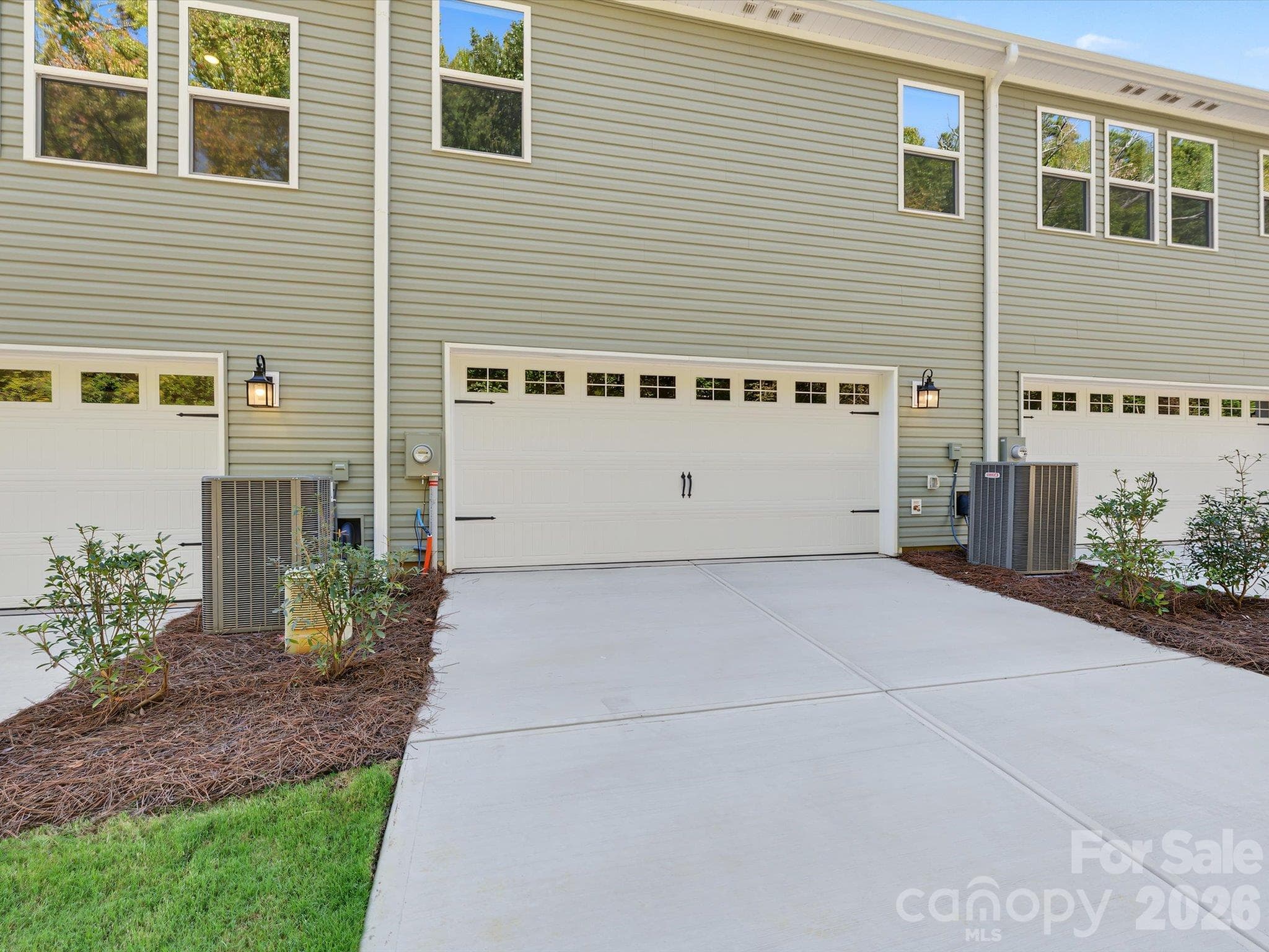 2 Car side-by-side garage and 20 ft. Garage Allowing for 4 Vehicles to be Parked at Home - 6617 Fire Lily Lane, Charlotte