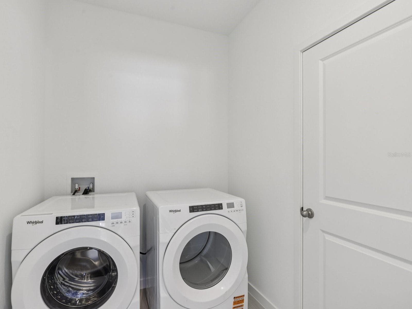 Photo is not of the actual home, but is an inspirational photo of builder’s model home and may depict options, furnishings, and/or decorator features that are not included. - 33 GARNI DR, PALM COAST