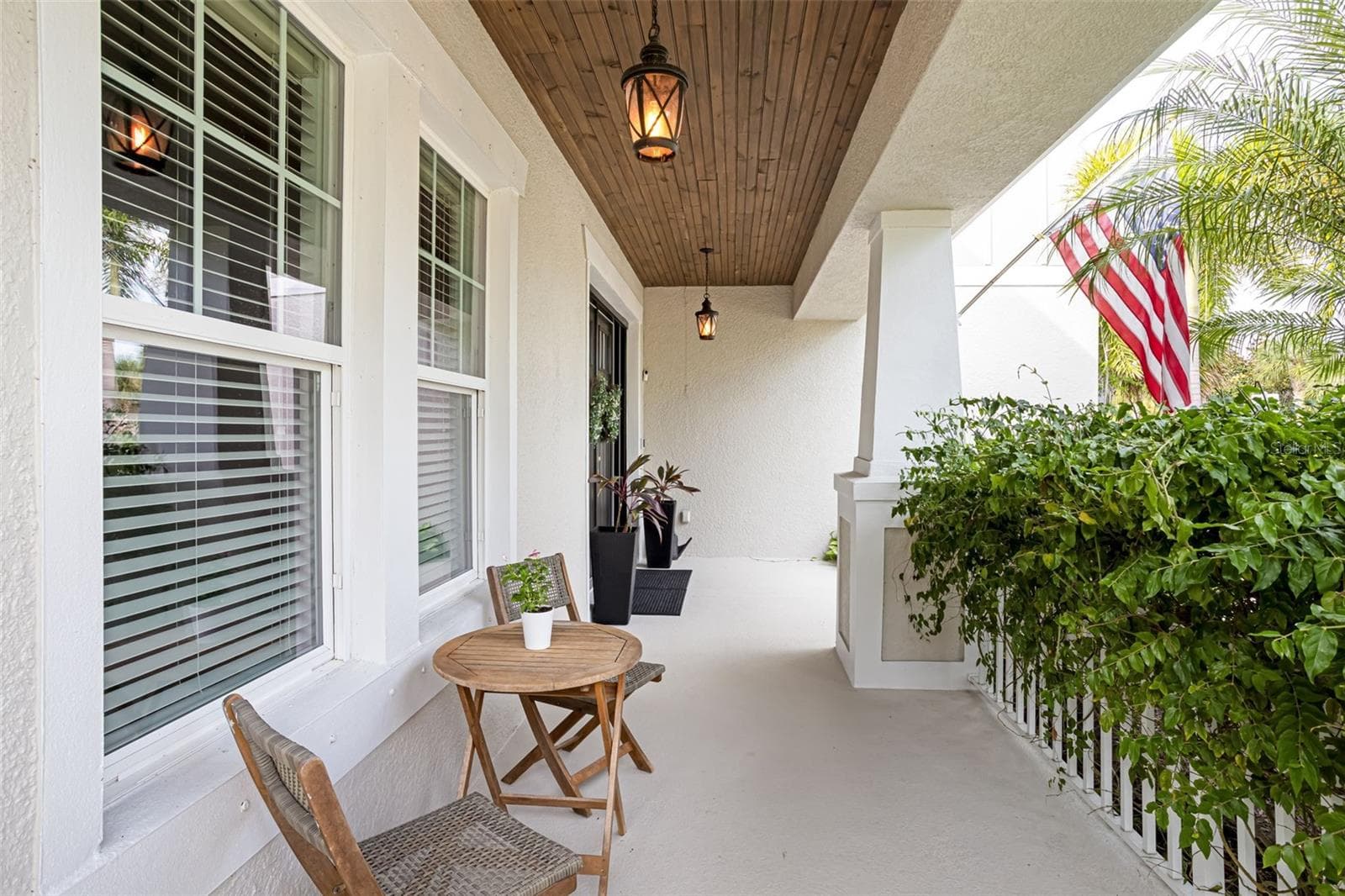 A cozy porch to sit back, relax, and enjoy the moment. - 6195 ANISE DR, SARASOTA