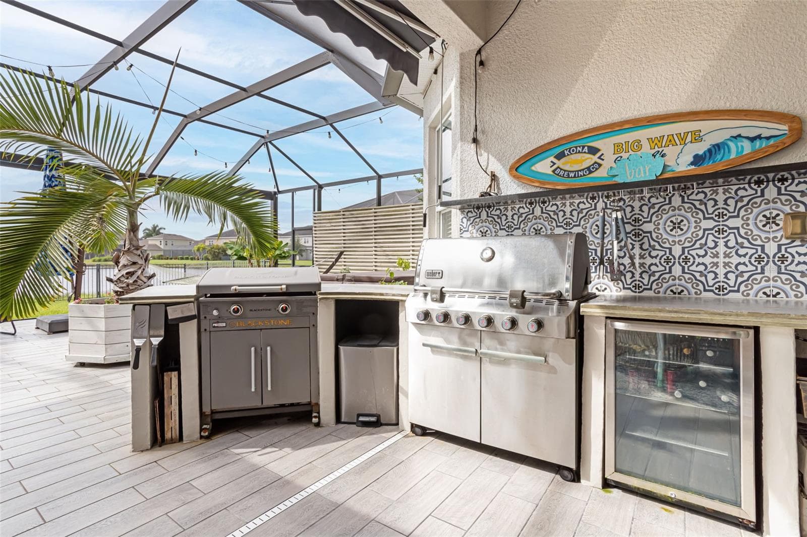 Take your outdoor entertaining to the next level with a kitchen and BBQ grill. - 6195 ANISE DR, SARASOTA