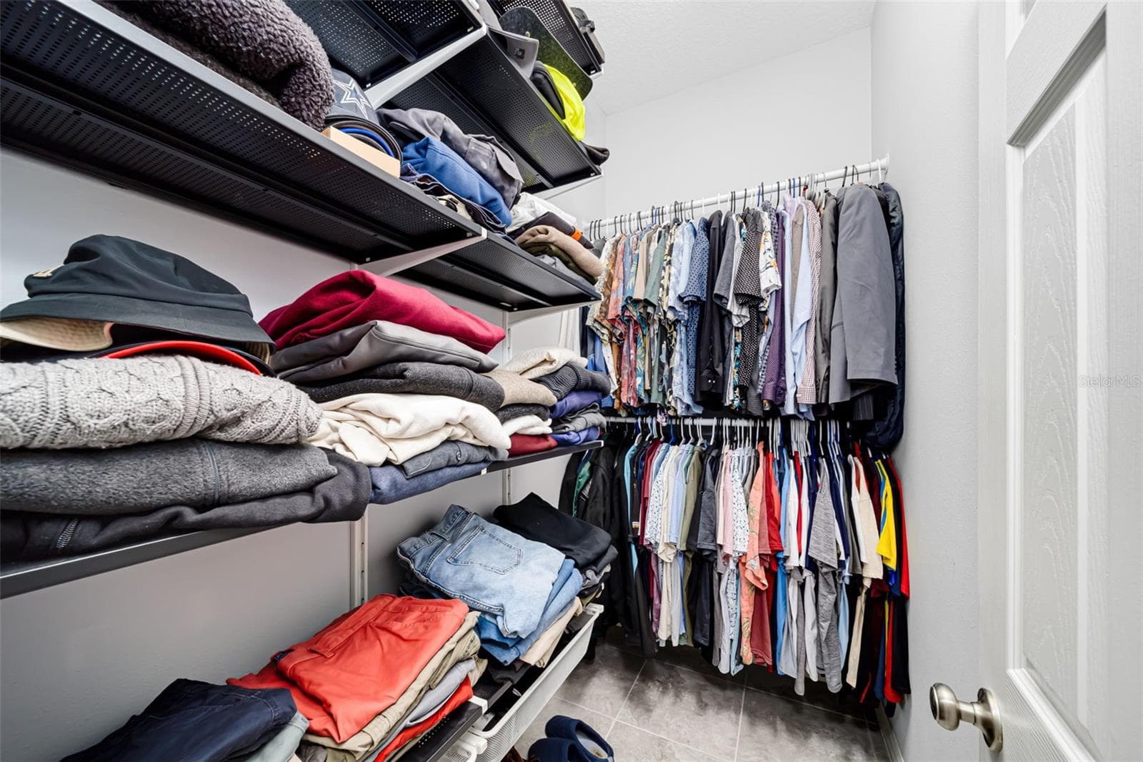 Enjoy the convenience of dual walk-in closets with dedicated storage for two. - 6195 ANISE DR, SARASOTA