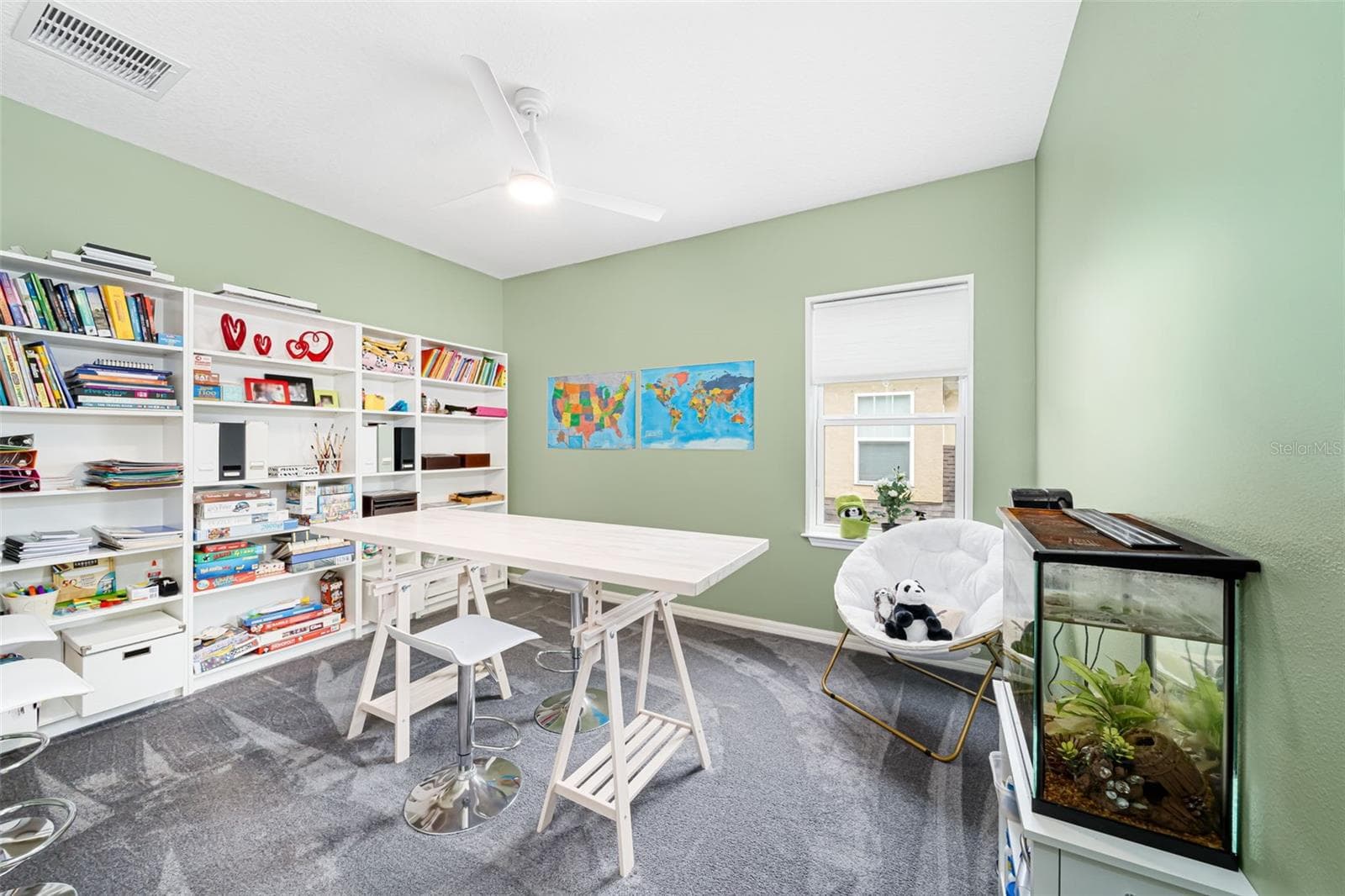 Versatile additional bedroom currently set up as a dedicated homework and study space. - 6195 ANISE DR, SARASOTA