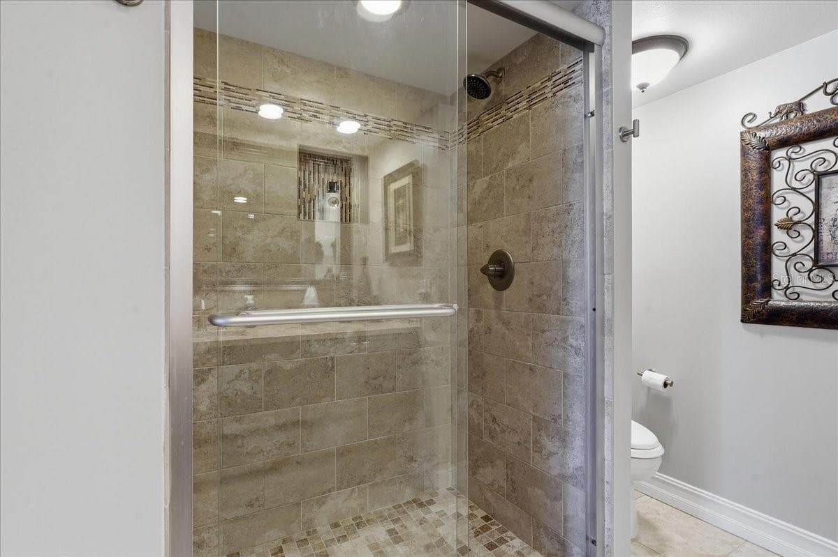 WALK IN SHOWER IN THE GUEST BATHROOM - 1430 GULF BLVD #407, CLEARWATER BEACH
