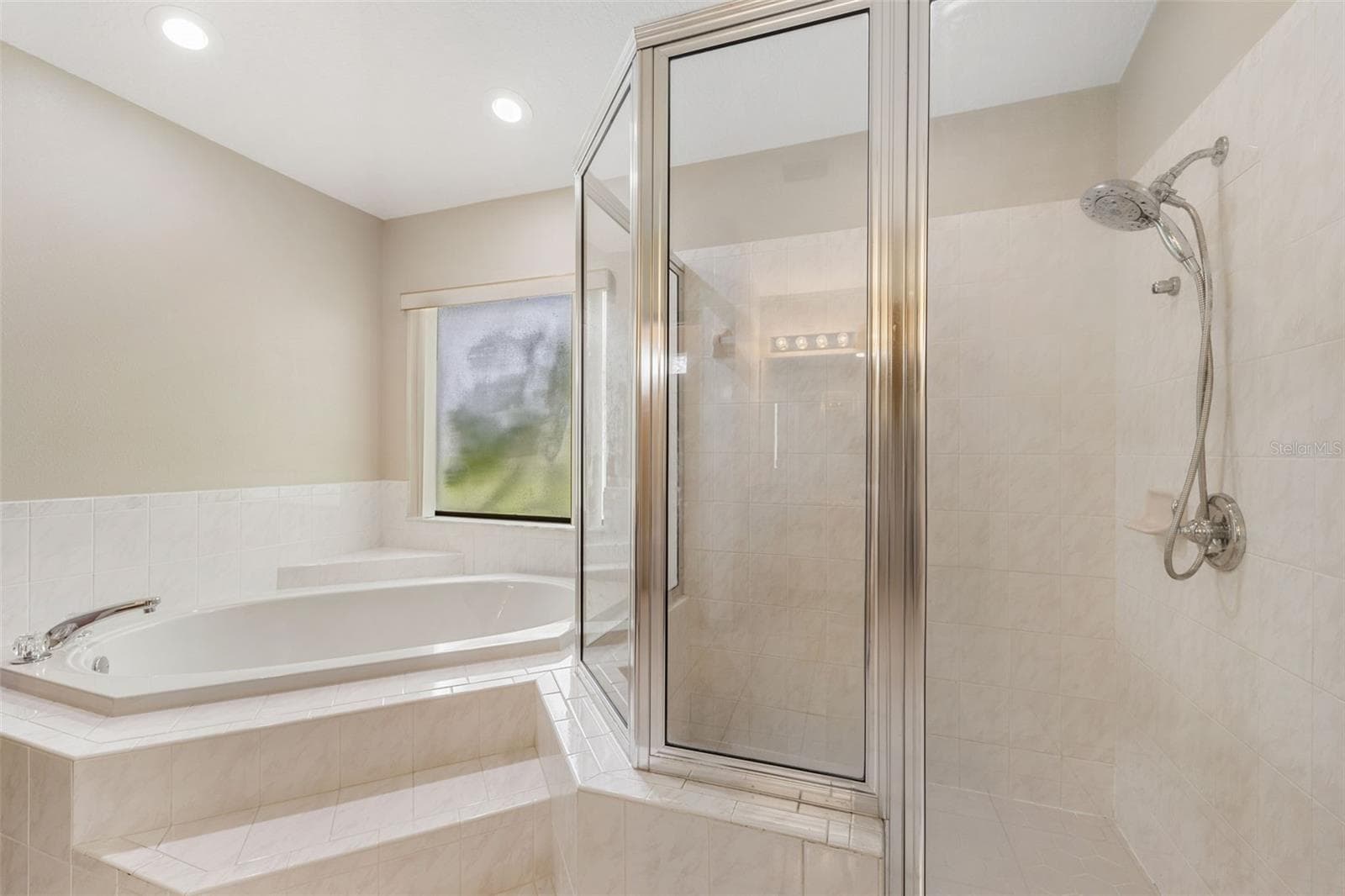 Master Bathroom with soaking tub and shower - 930 ALBRITTON WAY, LAKE WALES