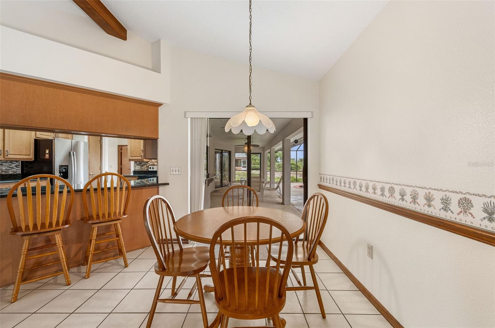 Eat in kitchen with sliding glass doors to screened in lanai - 930 ALBRITTON WAY, LAKE WALES