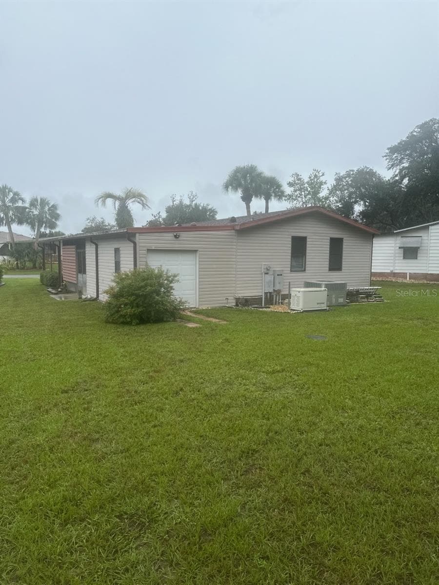 Manufactured Home at 438 TARRSON BLVD, LADY LAKE, photo 12 of 33