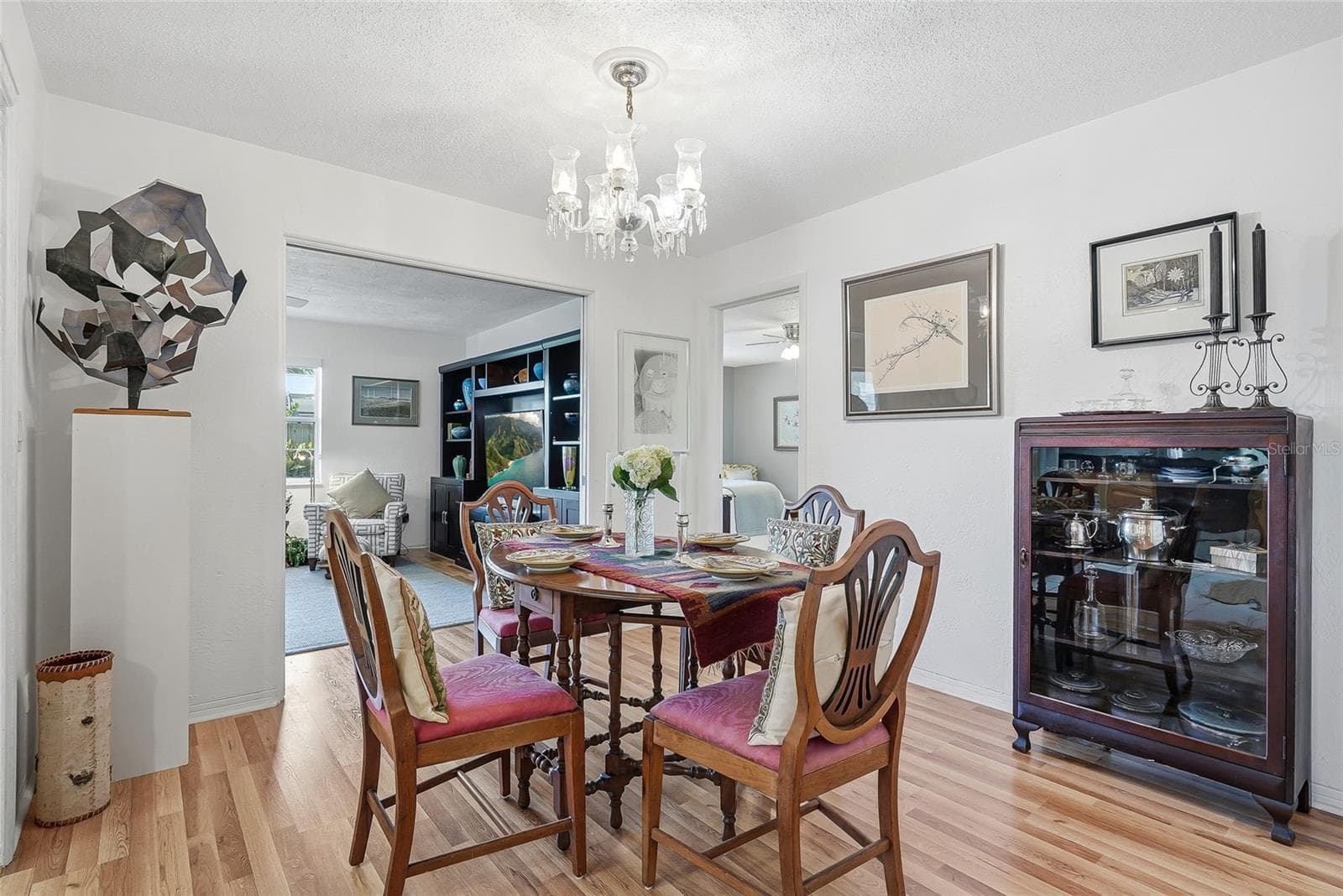 From everyday meals to special occasions, the dedicated dining area offers an inviting place to gather beside the family room. - 1890 62ND AVE S, ST PETERSBURG