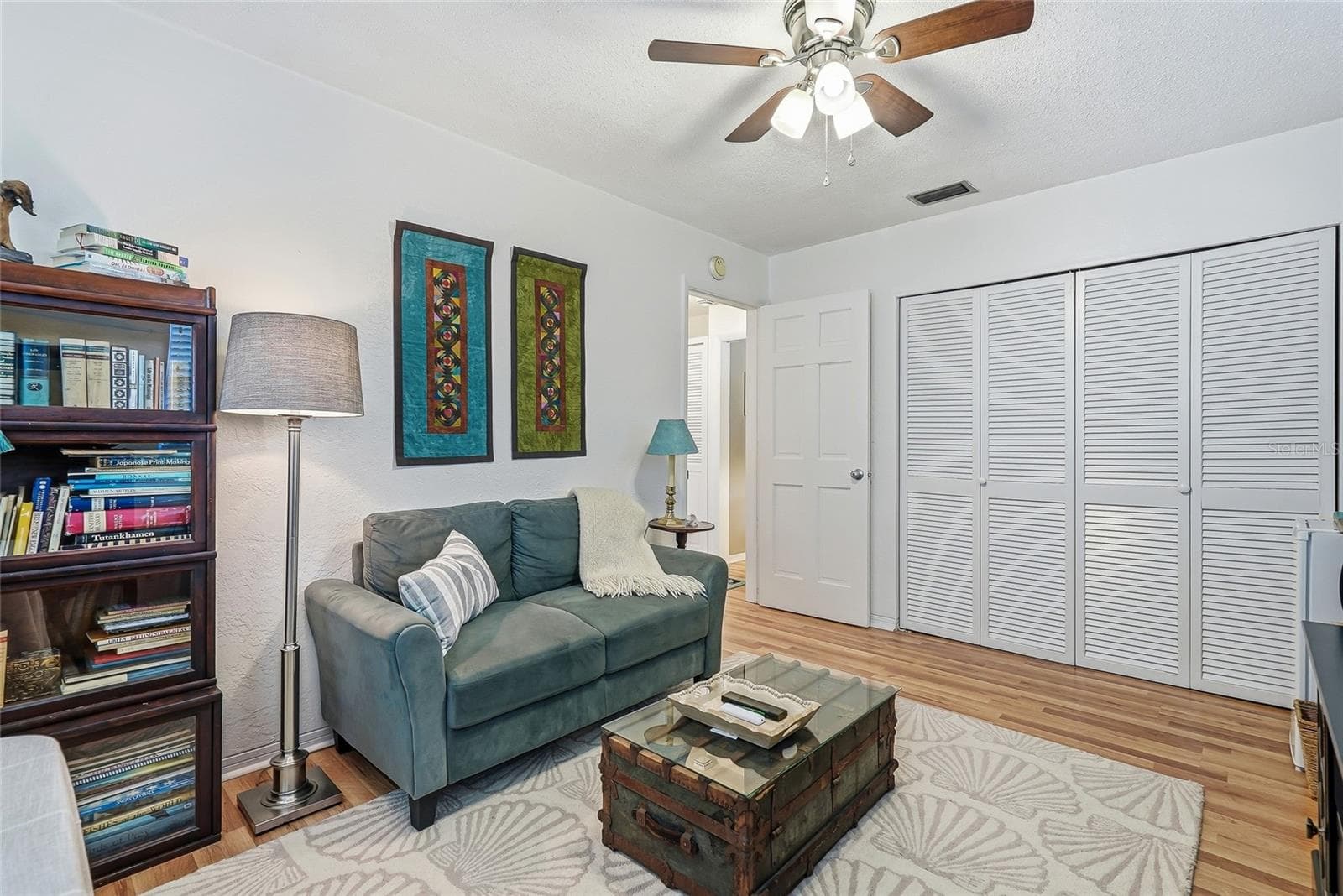 Make this third bedroom work for you as a sleeping space, home office, or cozy den, with a wide closet for everyday storage. - 1890 62ND AVE S, ST PETERSBURG