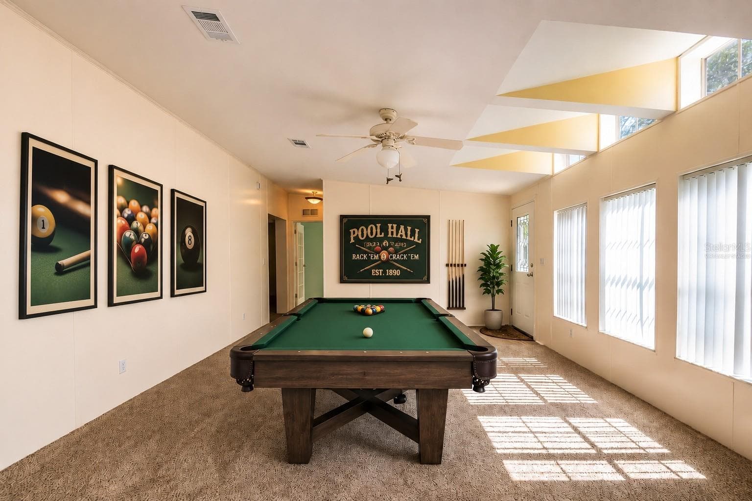 Virtually staged living room for playing Pool or Ping Pong. - 14221 HURRICANE DR, WEEKI WACHEE