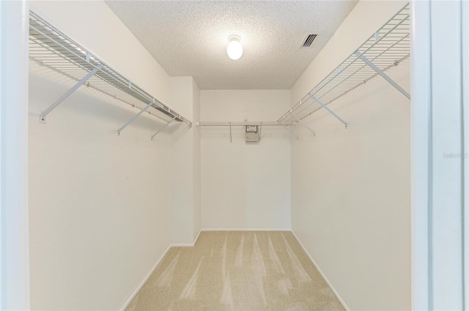 Primary closet - 4515 50TH DR W, BRADENTON