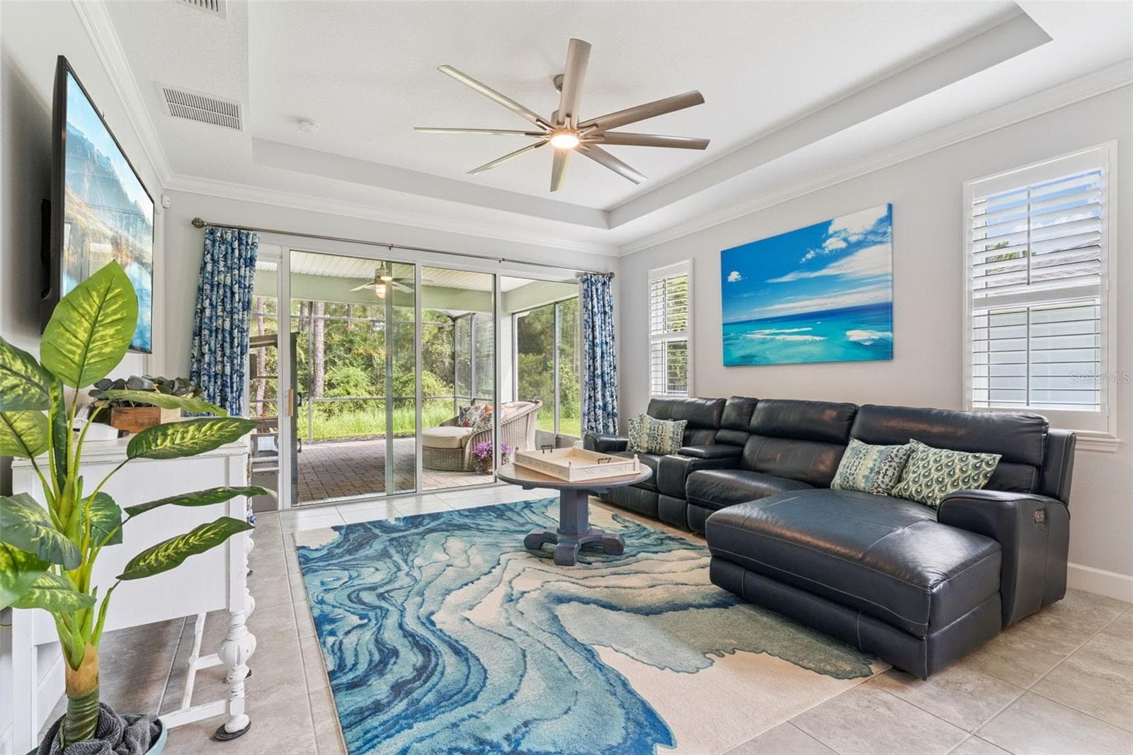 15' x 15' Great Room w/ Plantation style shutters & a conservation area view - 1305 HAYTON AVE., DELAND
