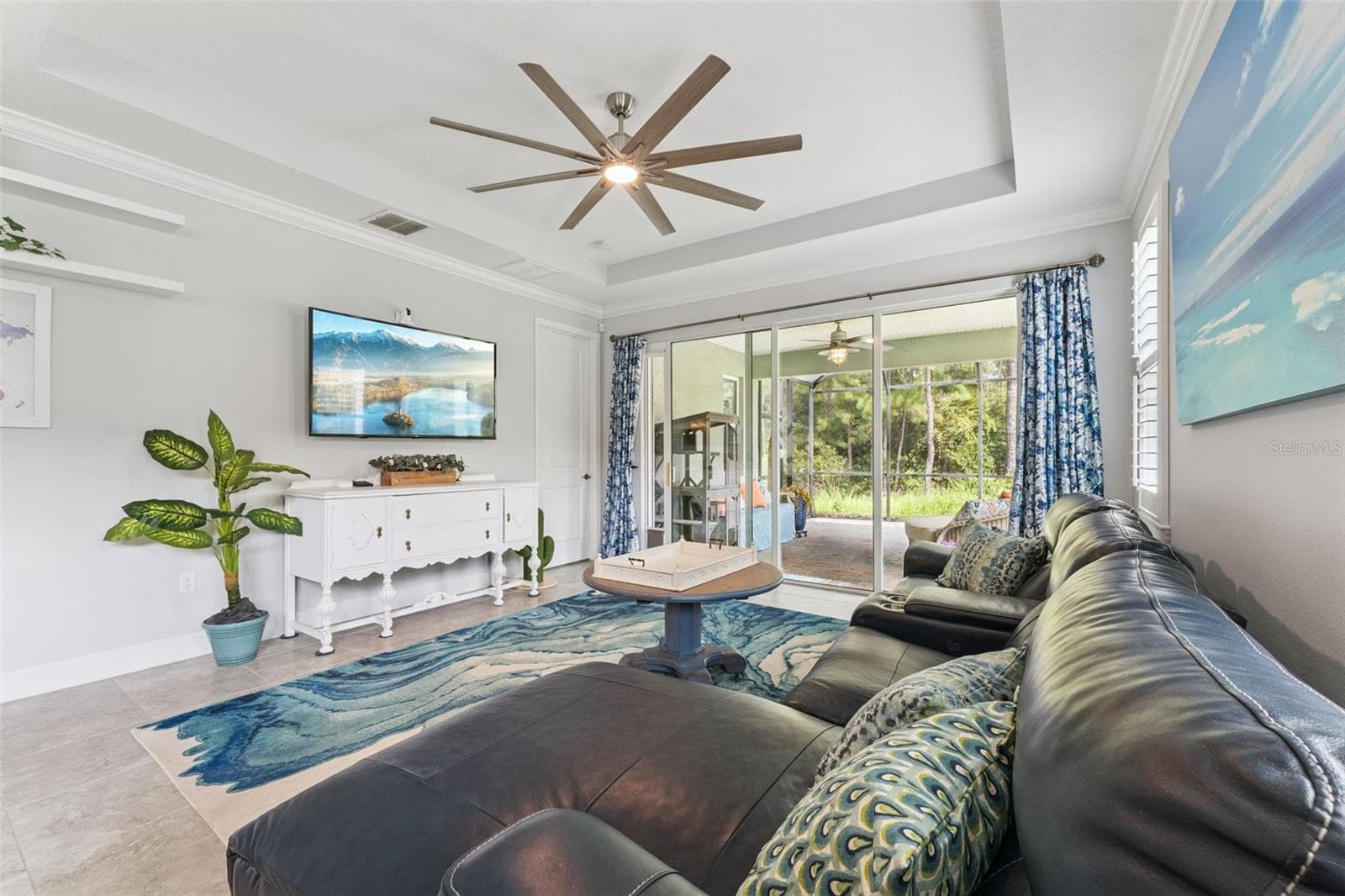 View of the Great Room & expanded screen enclosed covered patio - 1305 HAYTON AVE., DELAND