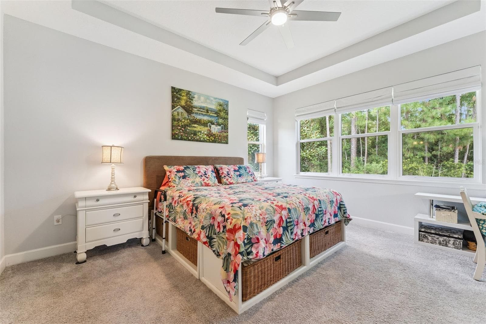 13' x 15' Primary Bedroom w/ tray ceiling, ceiling fan, pull-down shades & a conservation area view - 1305 HAYTON AVE., DELAND