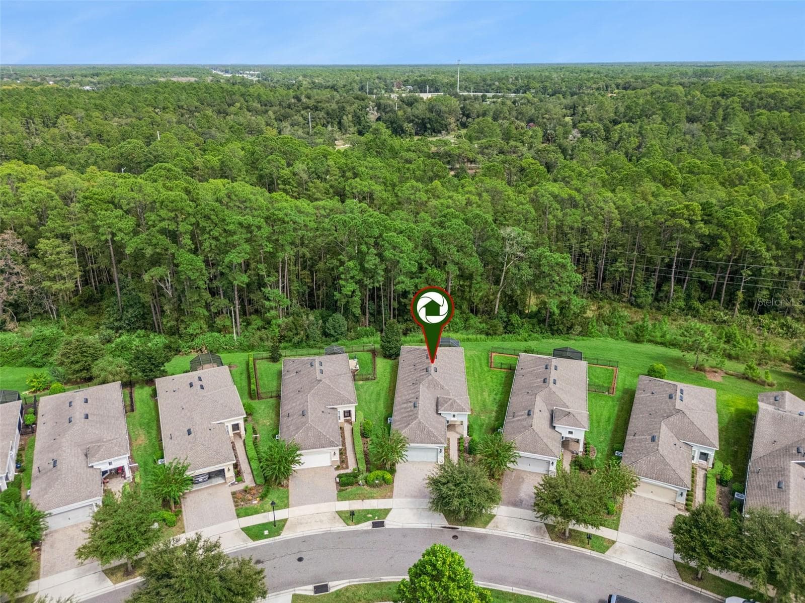 Aerial view of the Home's location w/ a conservation area view - 1305 HAYTON AVE., DELAND