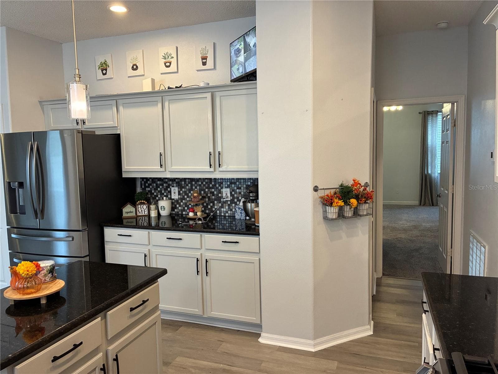 Kitchen and hall to master - 14212 SUNRIVER AVE, ORLANDO