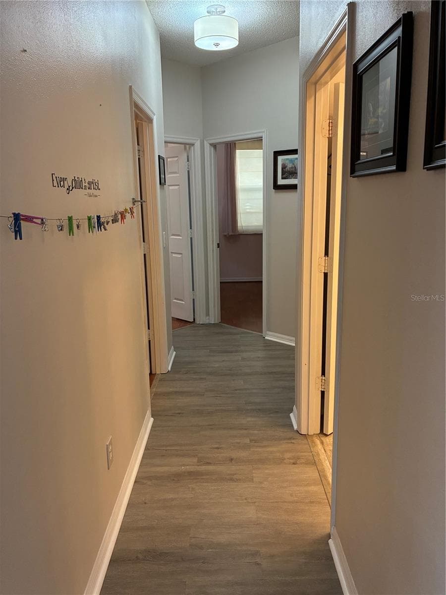 hall to 3 bedrooms - 14212 SUNRIVER AVE, ORLANDO