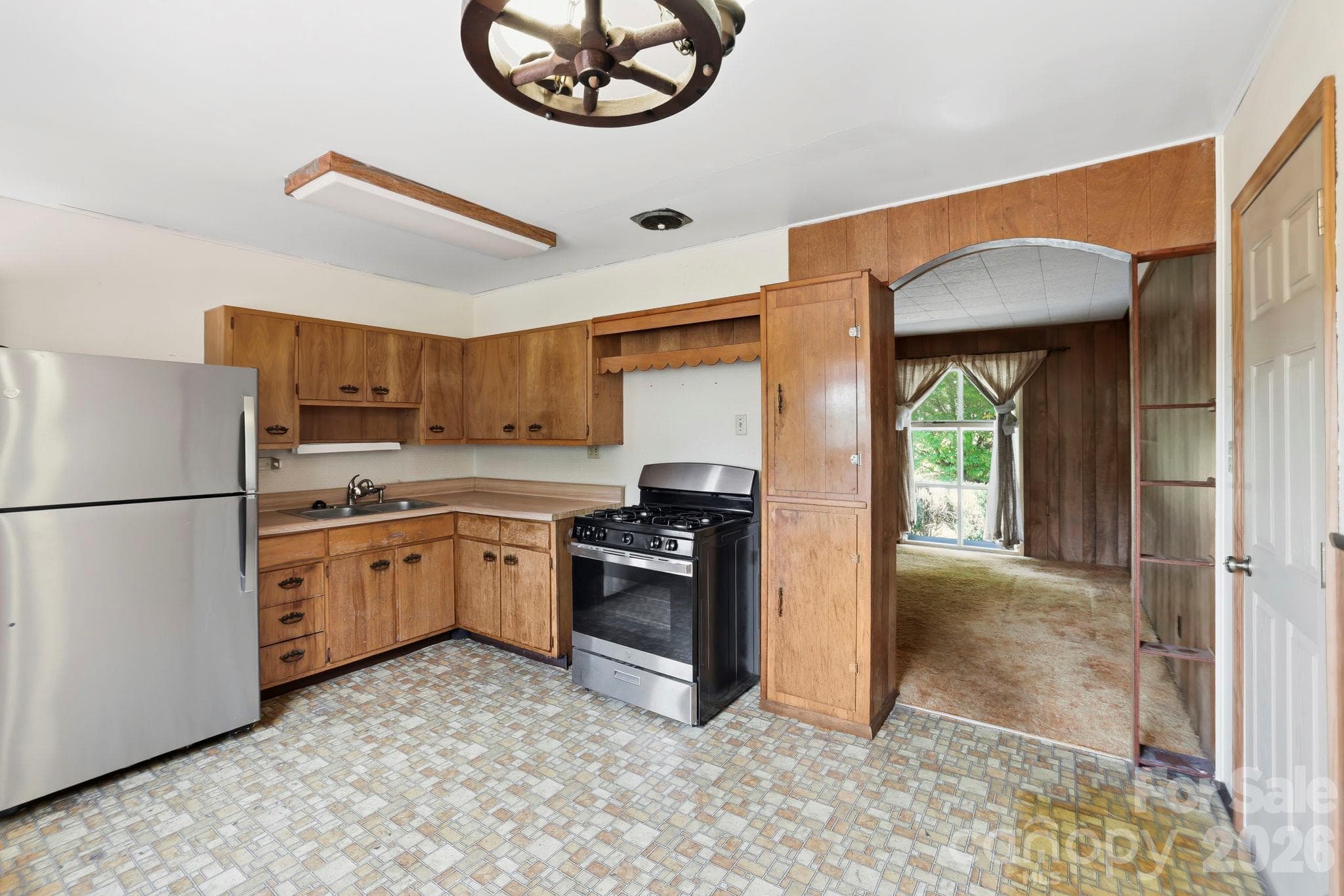 Kitchen, looking towards Living Room. Door on right is to the garage - 648 Crystal Drive - 648 Crystal Drive, Hendersonville