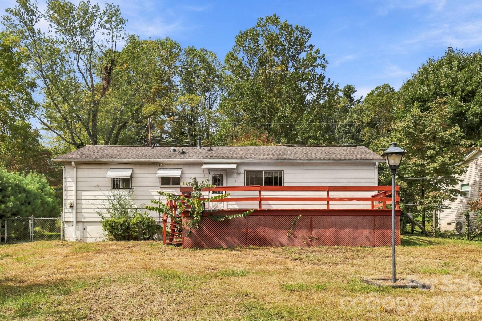 Large deck on rear of home overlooks spacious back yard - 648 Crystal Drive - 648 Crystal Drive, Hendersonville