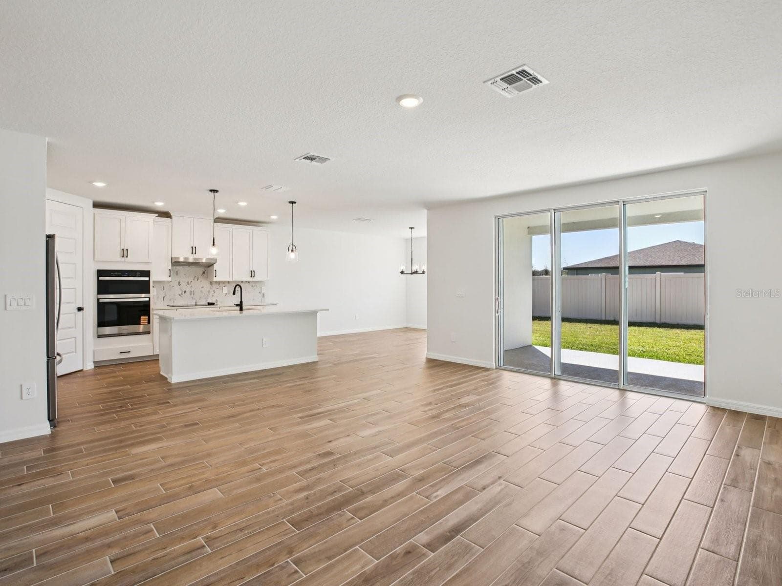 Photo is not of the actual home, but is an inspirational photo of builder’s model home and may depict options, furnishings, and/or decorator features that are not included. - 43 GARNI DR, PALM COAST