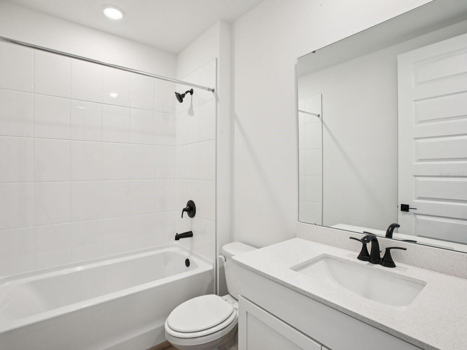 Photo is not of the actual home, but is an inspirational photo of builder’s model home and may depict options, furnishings, and/or decorator features that are not included. - 43 GARNI DR, PALM COAST