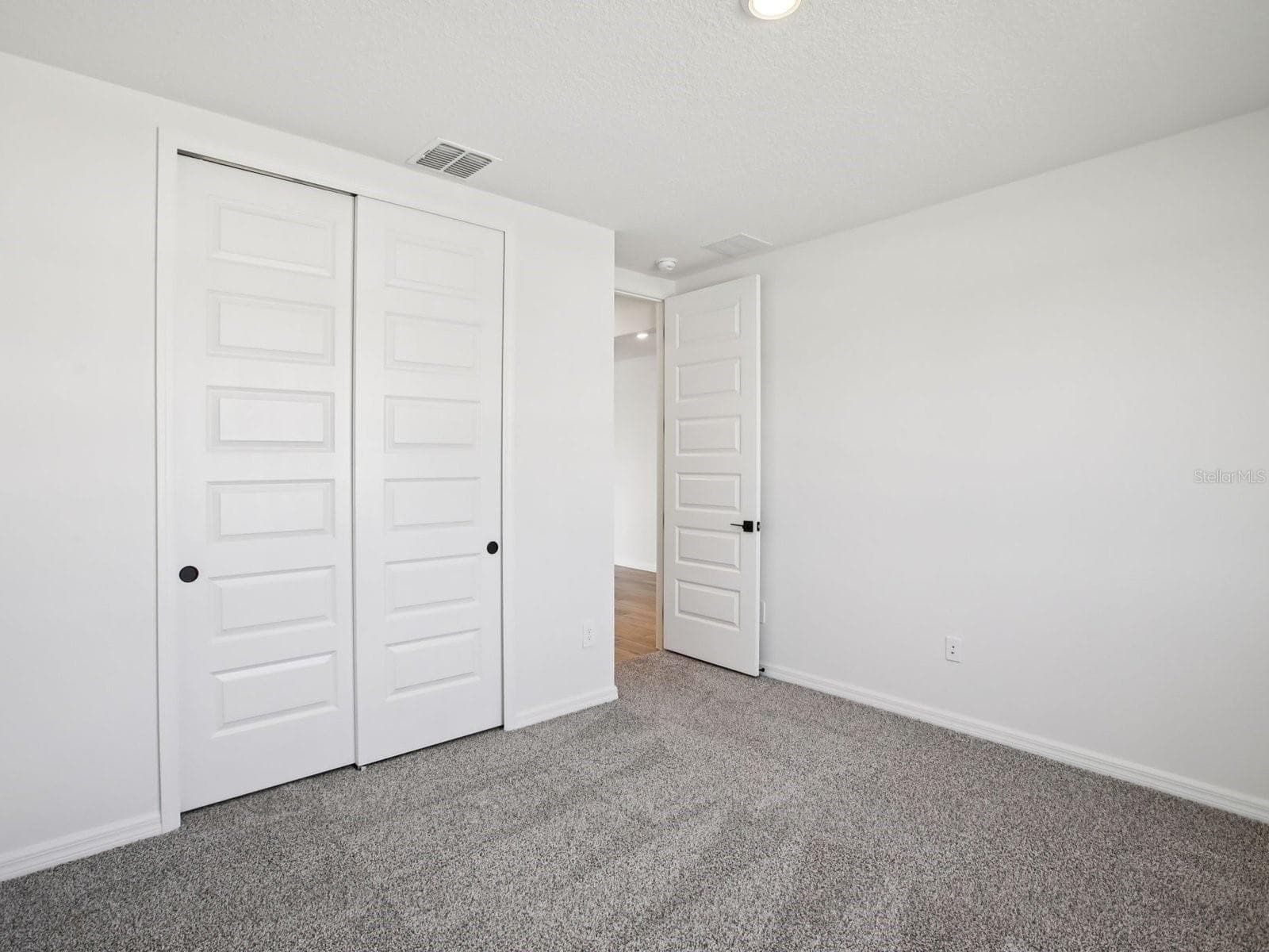 Photo is not of the actual home, but is an inspirational photo of builder’s model home and may depict options, furnishings, and/or decorator features that are not included. - 43 GARNI DR, PALM COAST