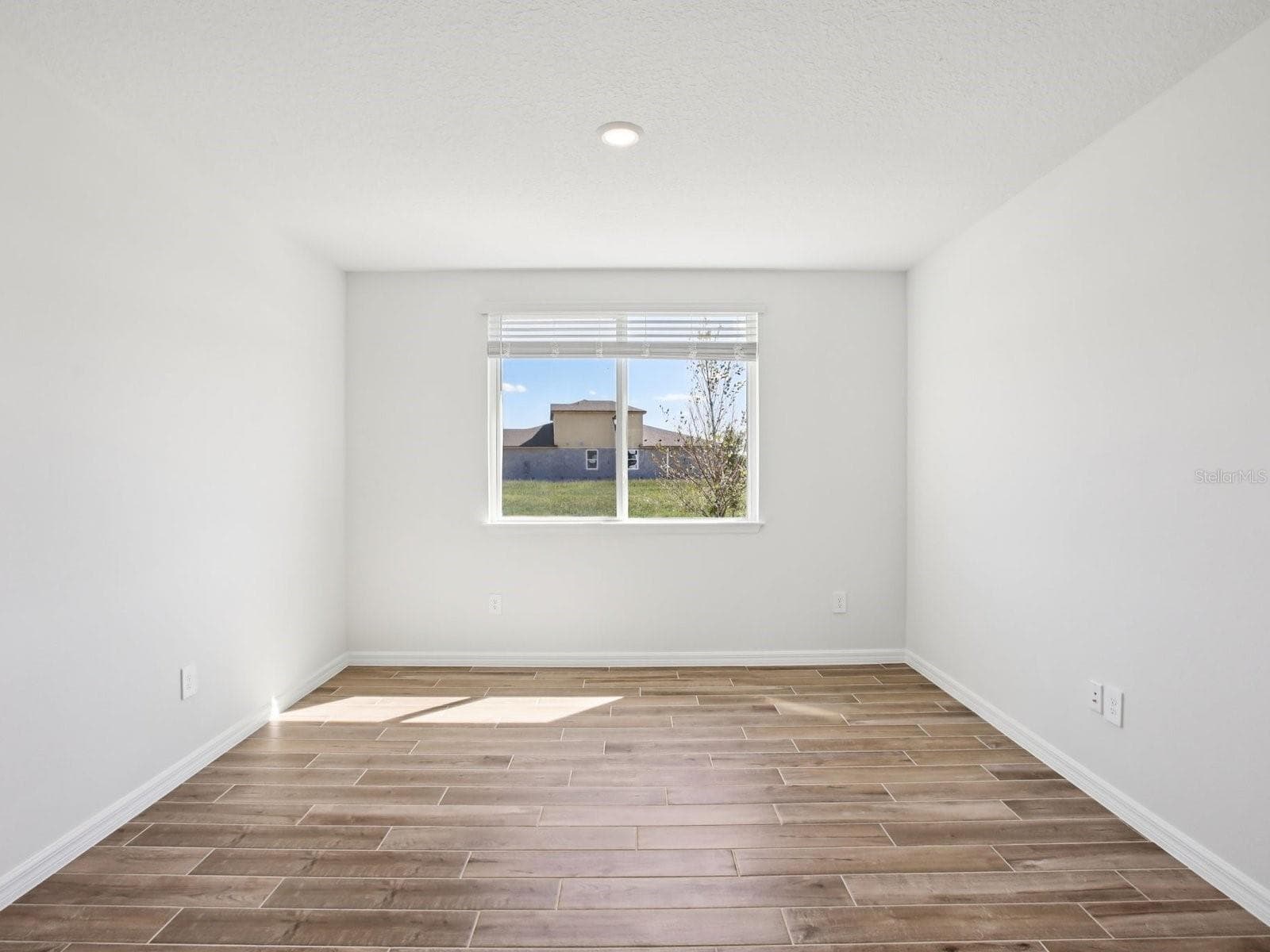 Photo is not of the actual home, but is an inspirational photo of builder’s model home and may depict options, furnishings, and/or decorator features that are not included. - 43 GARNI DR, PALM COAST