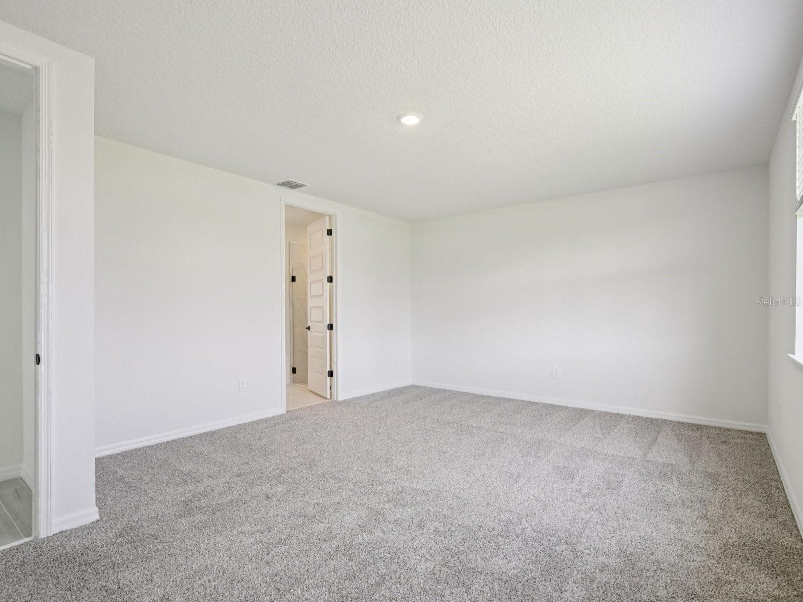 Photo is not of the actual home, but is an inspirational photo of builder’s model home and may depict options, furnishings, and/or decorator features that are not included. - 43 GARNI DR, PALM COAST