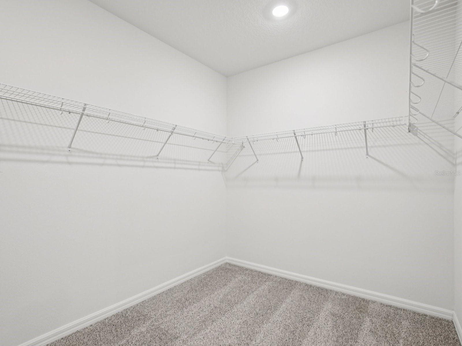 Photo is not of the actual home, but is an inspirational photo of builder’s model home and may depict options, furnishings, and/or decorator features that are not included. - 43 GARNI DR, PALM COAST