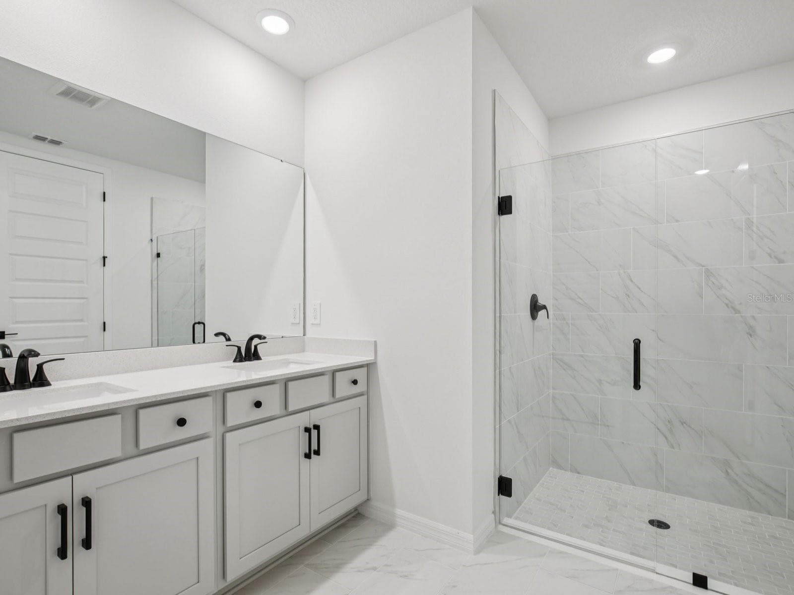Photo is not of the actual home, but is an inspirational photo of builder’s model home and may depict options, furnishings, and/or decorator features that are not included. - 43 GARNI DR, PALM COAST