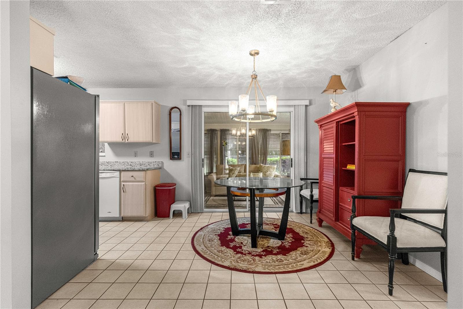 DINING TO KITCHEN AND FLORIDA ROOM - 10434 SE 178TH PL, SUMMERFIELD