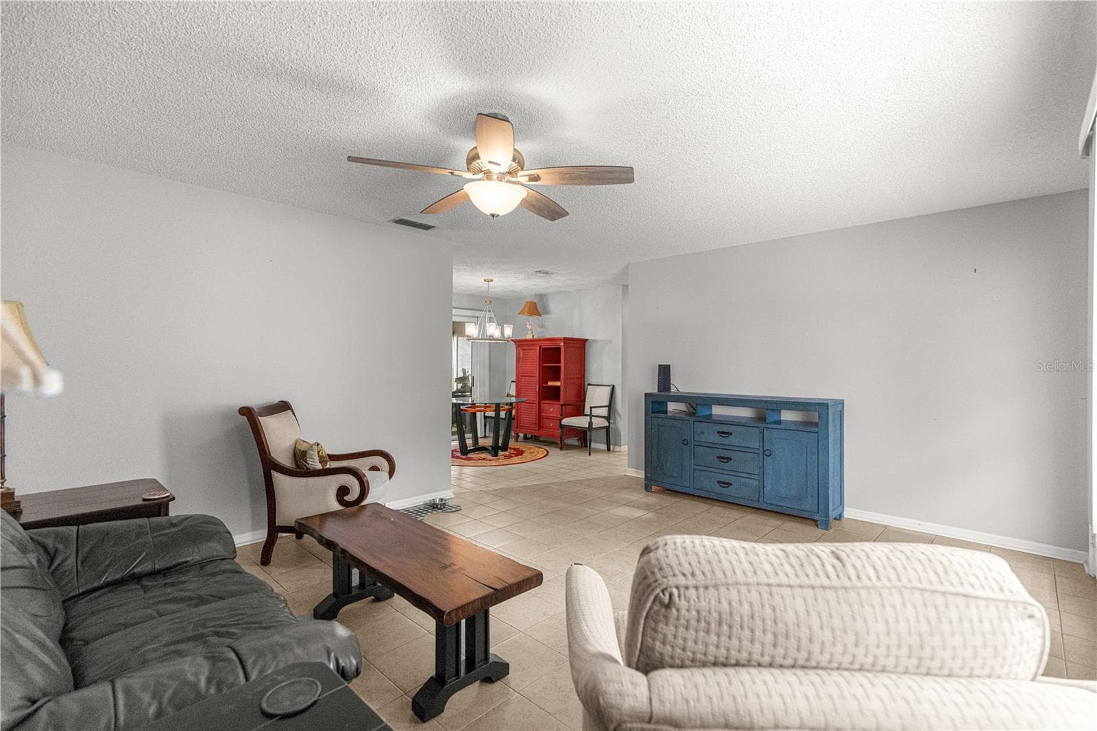 ANGLE VIEW OF LIVINGOOM TO DINING AREA - 10434 SE 178TH PL, SUMMERFIELD