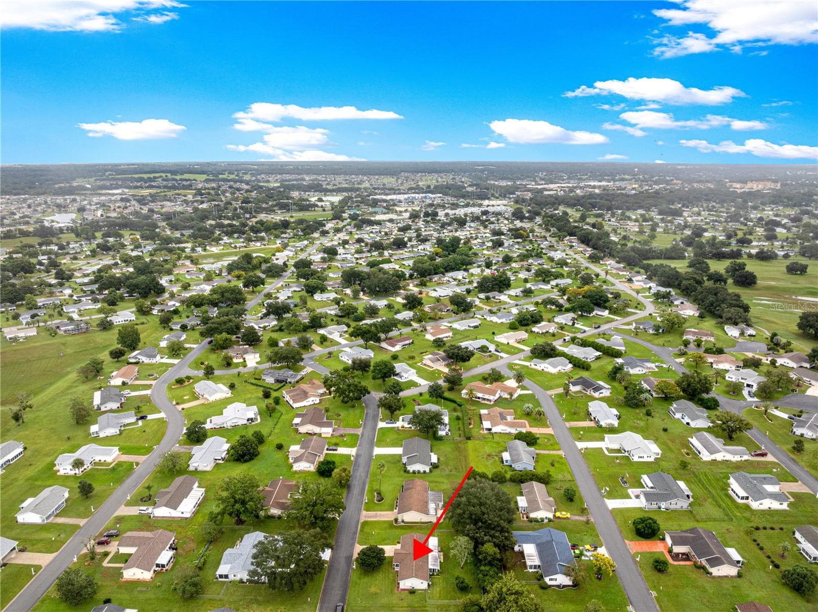 AERIAL OF HOUSE AND SURROUNDING HOMES IN COMMUNITY - 10434 SE 178TH PL, SUMMERFIELD