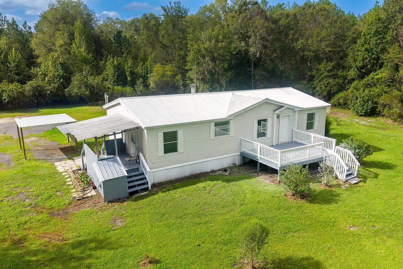 Manufactured Home at 3583 NW 216TH ST, LAWTEY, photo 8 of 68