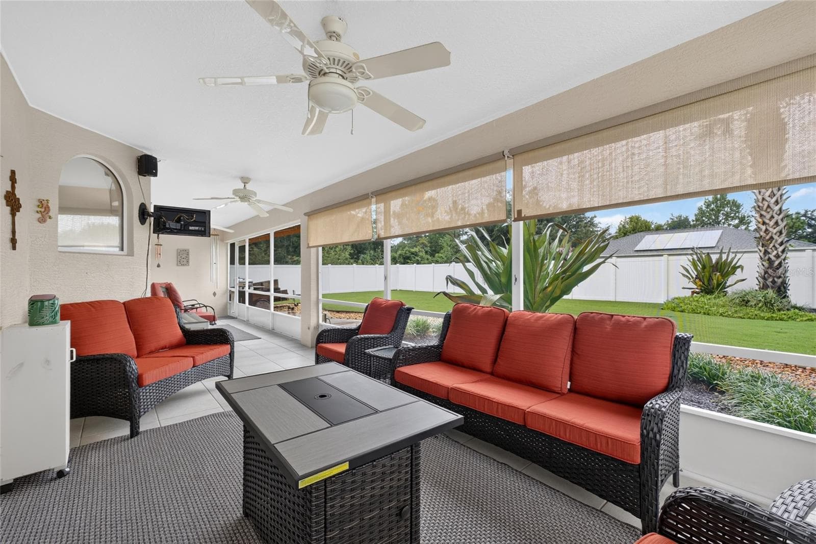 Sunroom with sunshades - 110 BURROUGHS DR, PALM COAST